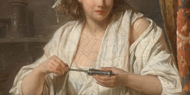 woman holding syringe