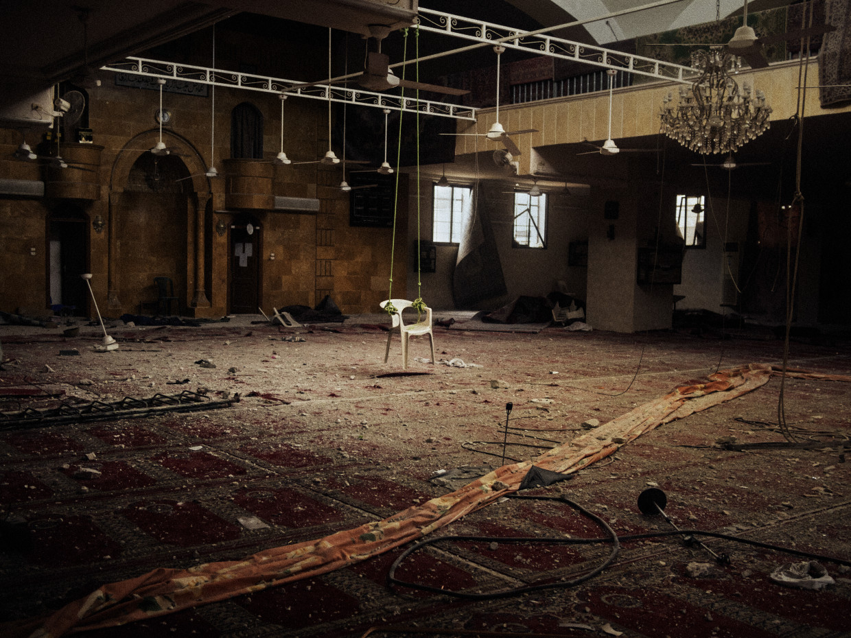 Aleppo, Syria. March, 2013. A makeshift swing made with a plastic chair found inside a mosque that was occupied by Syrian Army soldiers on the Salahaddin front line in Aleppo.