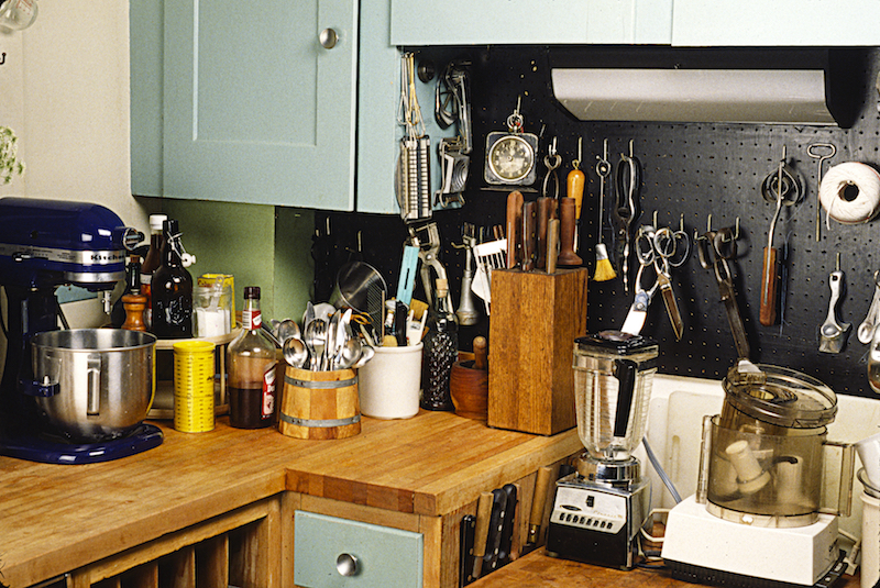 Storage along counters next to wall oven.