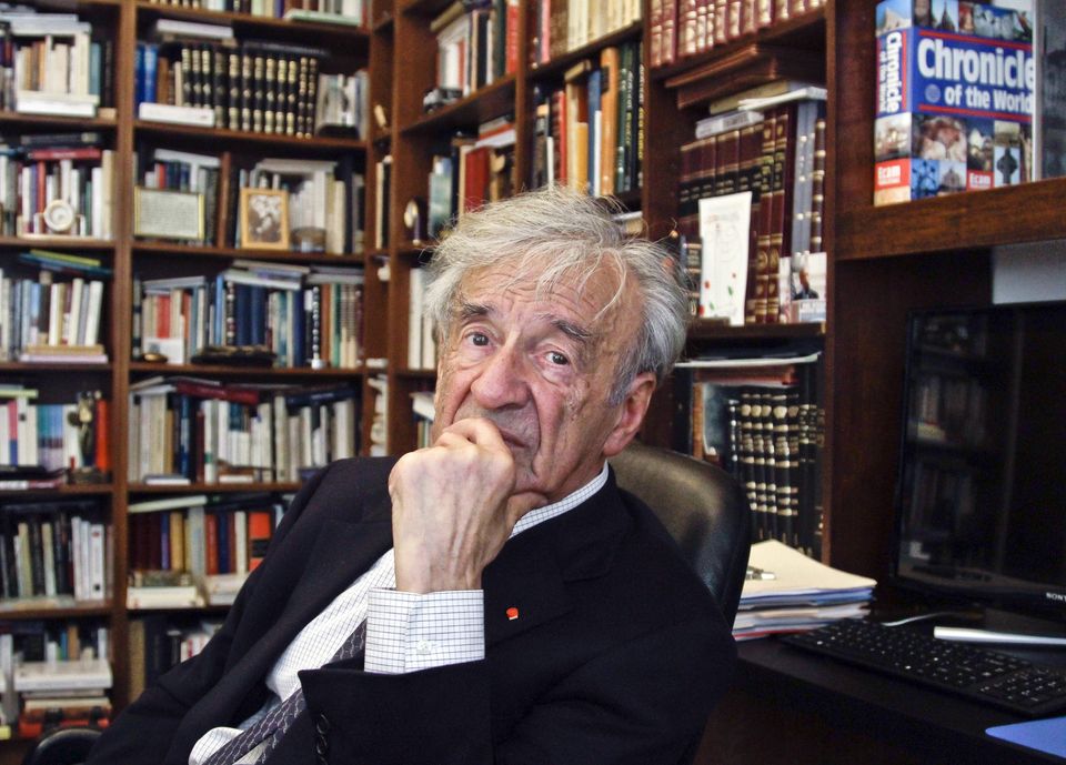 Author and Nobel Laureate Elie Wiesel surrounded by books.