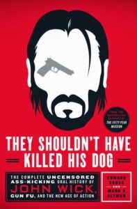 The movie John Wick 2. John wears a dirty white shirt. This is because all  his clothes and his washer were burned up when they blew up his house. His  dog is