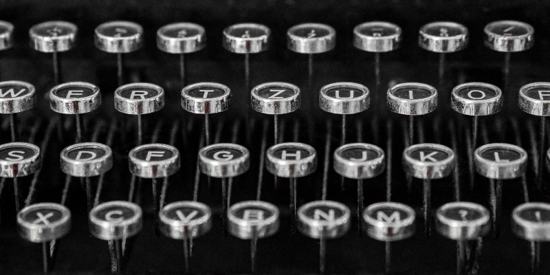 Woman Working At Typewriter by George Marks