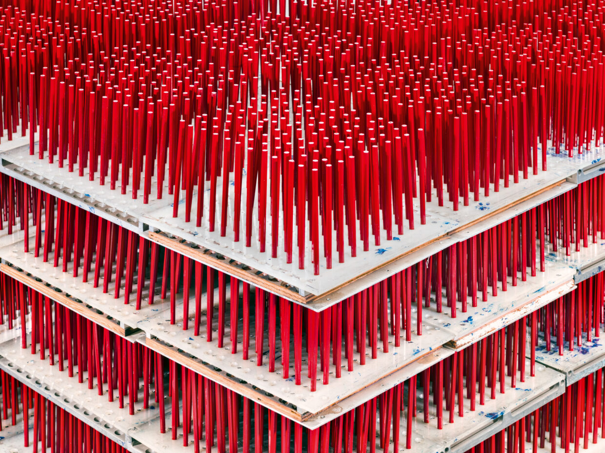 Red/blue editing pencils before dunking in blue paint. General Pencil Company, Jersey City, New Jersey
