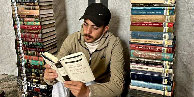omar hamad with his books in gaza