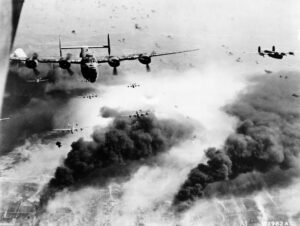bomber planes above clouds of explosions in wwii-era yugoslavia